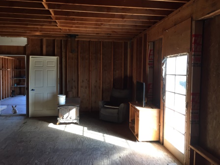 Interior frontroom to garage doorway.JPG